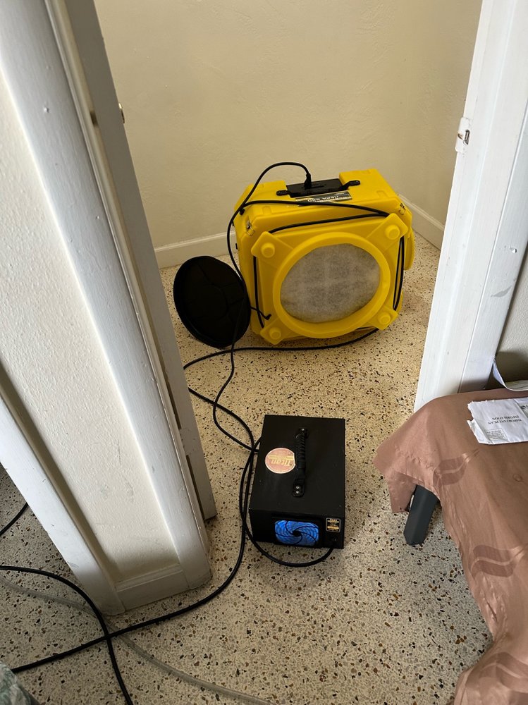 HEPA air scrubber and dehumidifier running during a Mississauga drying job